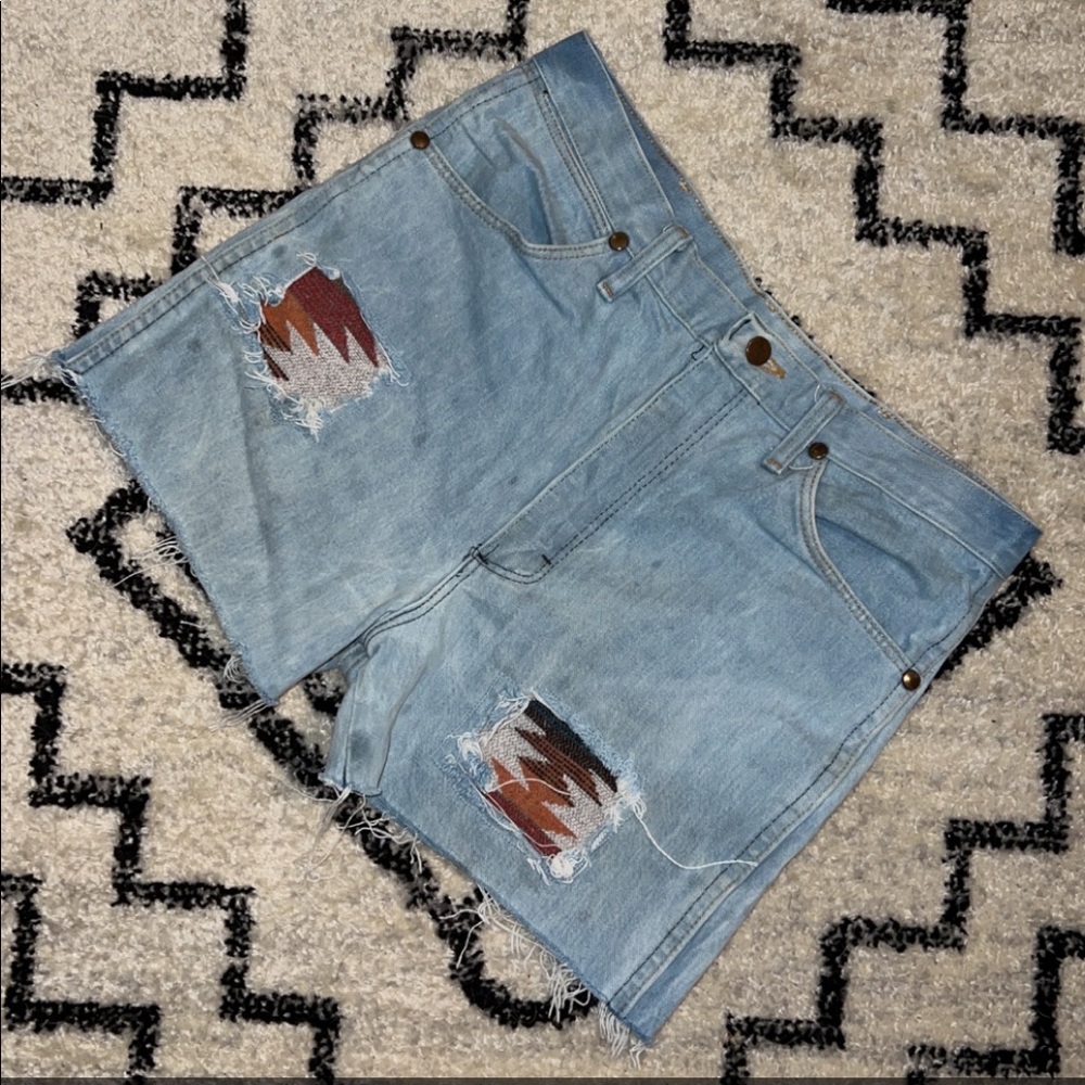 Upcycled wrangler shorts with Aztec inserts